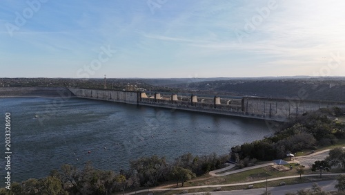 Bild auf Leinwand Aerial view of Lake Travis dam and TX hills