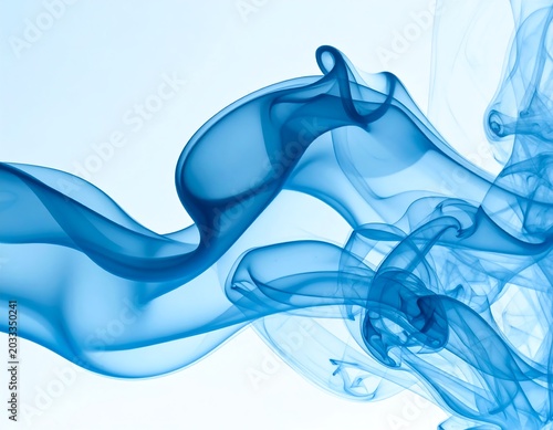 Flowing Blue Smoke Waves Forming Abstract Shapes on White Background