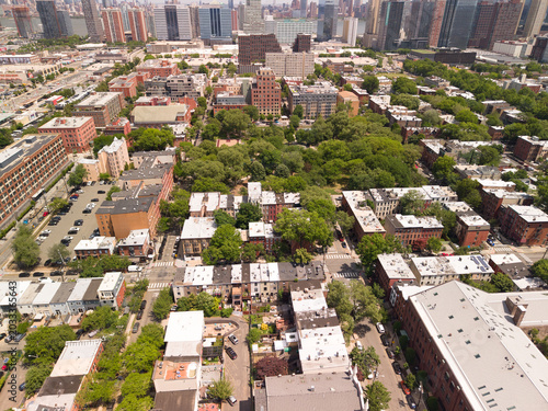 фотографія Aerial drone view highlighting van vorst park as a central green space within je