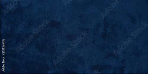Obraz na płótnie A vintage blue grunge background featuring a dark textured paint pattern on an a