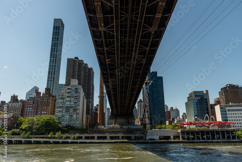 Canvas Print Scenic Manhattan vista from under the Queensboro bridge taken from a boat, New Y