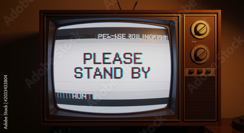 Retro television screen displaying 'please stand by' message on dark ambient room setting with old technology