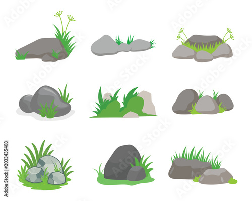 Slika na platnu Smooth grey stones and grass patches