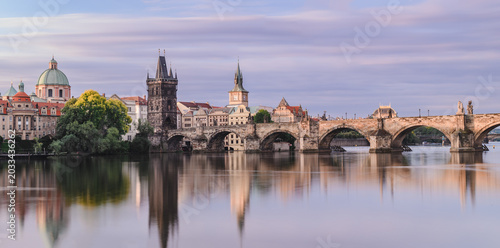 Soft Dawn Reflections of Charles Bridge in Prague