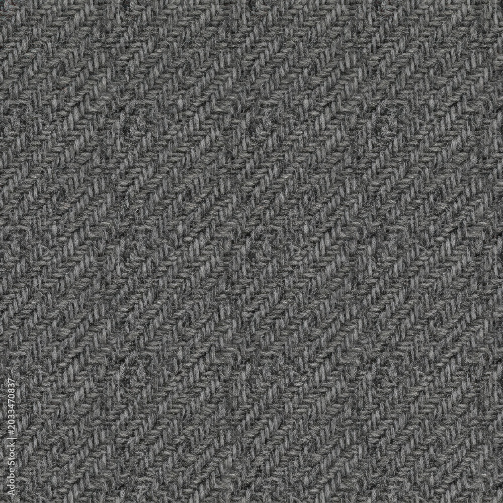 Fototapeta premium Gray textured fabric close-up background.