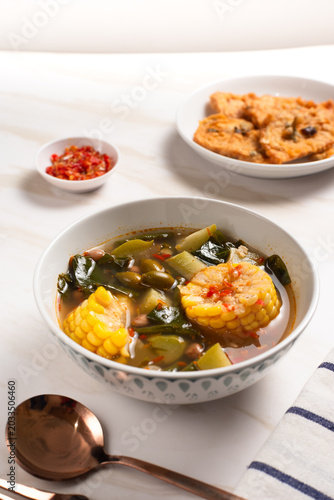 Sayur Asam or Sayur Asem is a type of vegetable dish that is typical of Indonesia. Perfect for recipe, article, catalogue, or any commercial purposes. with copy space.