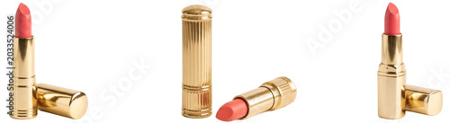 Photos Soft coral lipstick in radiant gold tubes, warm peachy pink bullets standing and