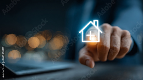 Real estate investment concept with glowing house icon and hand pointing at digital screen at night