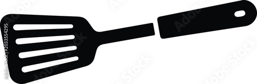 Photos Silhouette vector of a slotted spatula kitchen utensil design