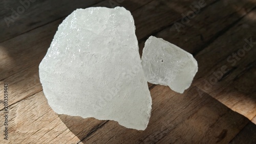 Obraz na płótnie Crystal clear alum on wooden board.