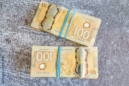 Valokuva Bundles of Canadian one hundred dollar notes
