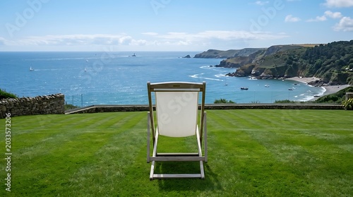 A high-resolution, eye-level photograph of a wooden deckchair with a white canvas sling, centered on a perfectly manicured green lawn