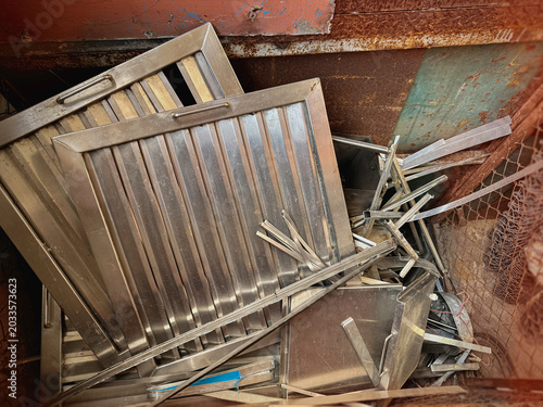 Used stainless steel wasted,dust and rust parts put in recycle junkyard,