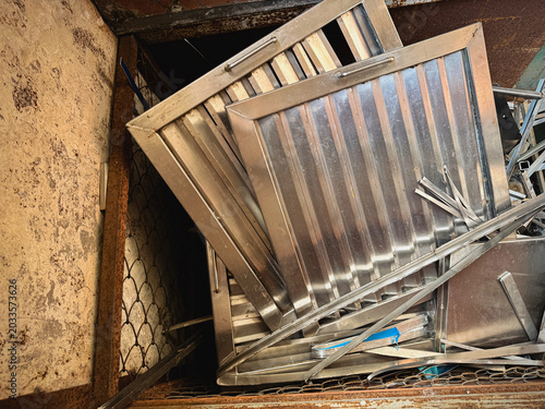 Used stainless steel wasted,dust and rust parts put in recycle junkyard,
