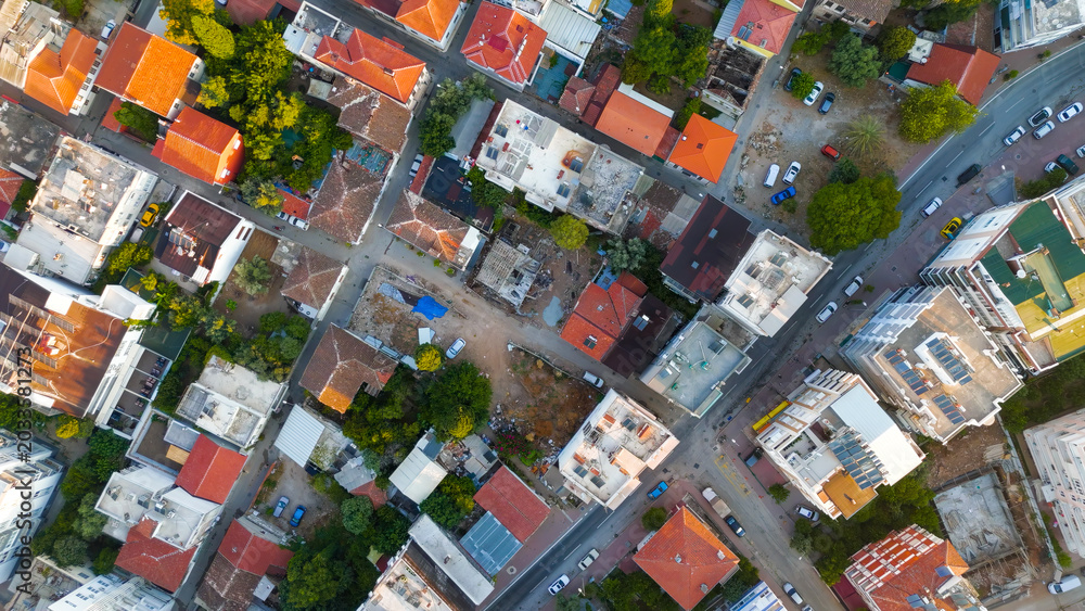 Naklejka premium Antalya, Turkey. Aerial drone view of modern streets seamlessly transitioning into historic Kaleici Old Town district in morning light.. Aerial View