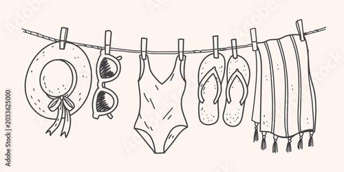 фотографія hand drawn set of Summer beach accessories dried on a rope