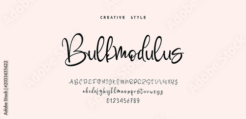 Handwritten Script Font with Uppercase Lowercase and Numbers on Dotted Background