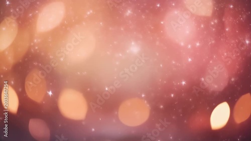 Dreamy bokeh background with warm pink and orange light circles and subtle sparkling glitter. Romantic valentine bokeh background.