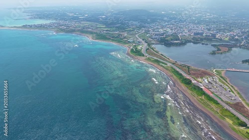 Aerial drone view of Gwangchigi Beach and Seongsan Ilchulbong coastline in Jeju Island South Korea
