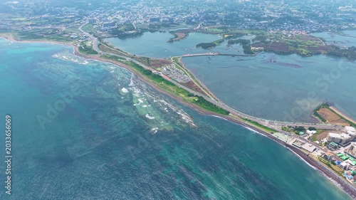 Aerial drone view of Gwangchigi Beach and Seongsan Ilchulbong coastline in Jeju Island South Korea