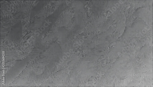 Gray textured surface with a rough terrain like a moon or planet landscape