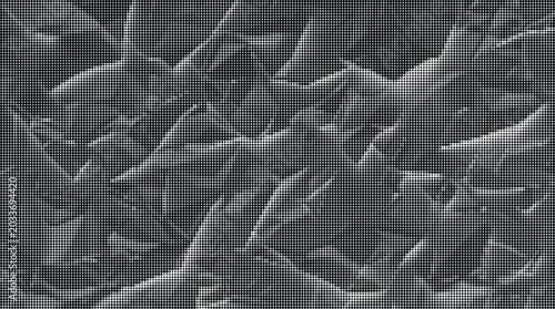 Close-up view of sharp, jagged, metallic structures on a surface