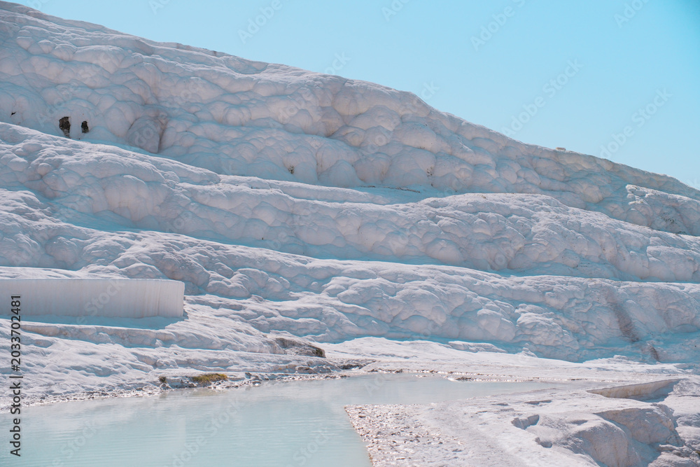 Fototapeta premium Puffy white travertine wall with cloud-like formations in Pamukkale