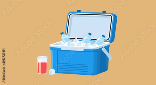 Portable blue cooler box with small medication bottle nearby.