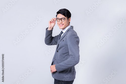 Photos Smiling Businessman Adjusting Eyeglasses
