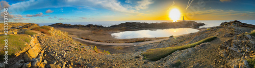 Canvastavla Menorca favaritx lighthouse reflecting sunset on coastal landscape