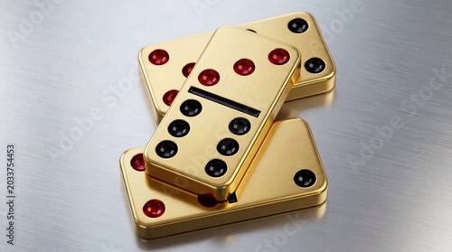 Golden domino pieces with red and black dots stacked on brushed silver metal surface, luxury table games, high end gambling entertainment.