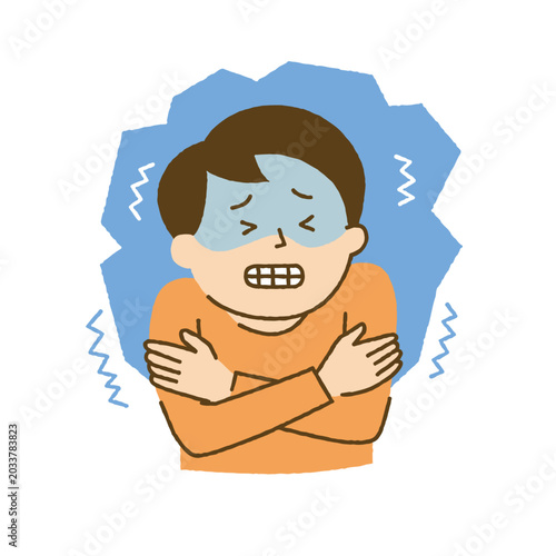 寒気に震えている男性