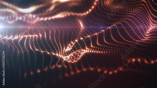Orange glowing dotted wave with flowing curves and bright highlights, creating an abstract futuristic technology background