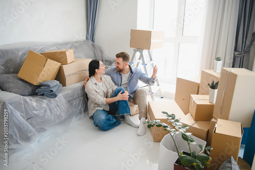 Photography Happy couple moving to new home apartment together