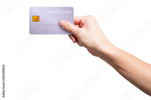 A close-up man hand holds a silver card isolated on white background with a clipping path.