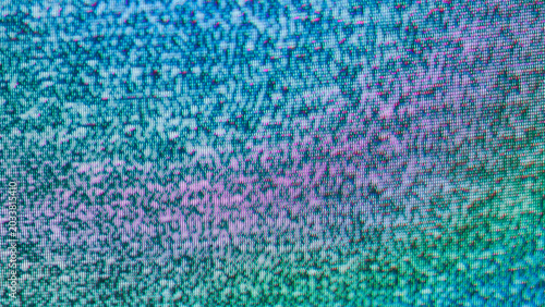 Fényképezés Crt tv static with green teal and pink purple blotchy color patches on pixel scr