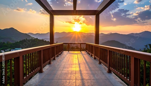 Serene mountain sunset view from a wooden balcony