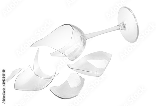 Bild auf Leinwand Broken wine glass shattering into sharp transparent pieces