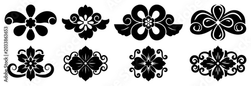 Foto Floral ornaments and symmetrical folk style decorative motifs for design