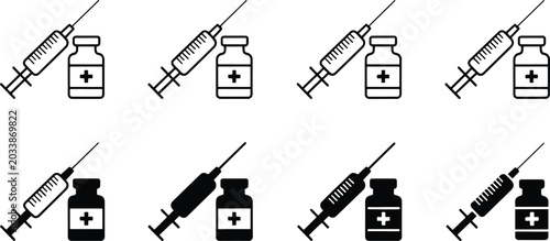 Quadro su tela Set of medical syringes with vials containing clear liquid medication isolated o
