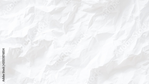 Fotografi Crumpled white paper texture background with wrinkled and folded surface seamles