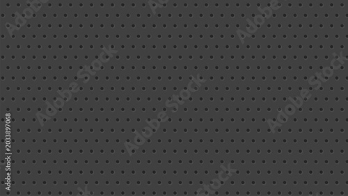 Fotografie Dark perforated panel background with small round holes.