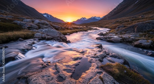 Sunrise Colors Reflecting in a Mountain River Landscape