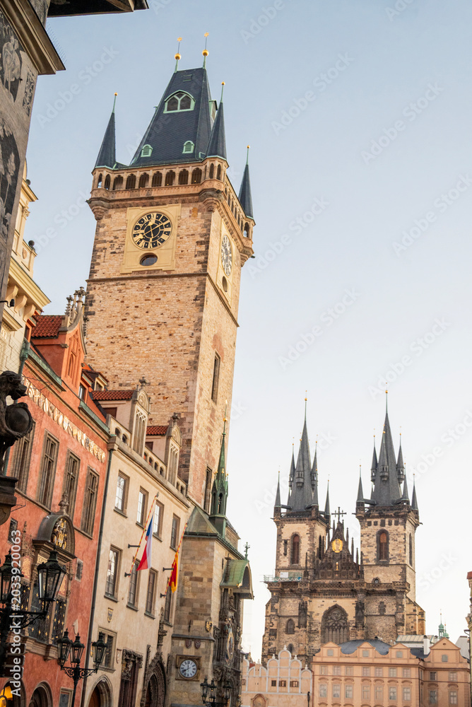 Obraz premium Historical Old Town Square in Prague, Czech Republic, featuring the iconic Astronomical Clock tower and the Church of Our Lady before Týn