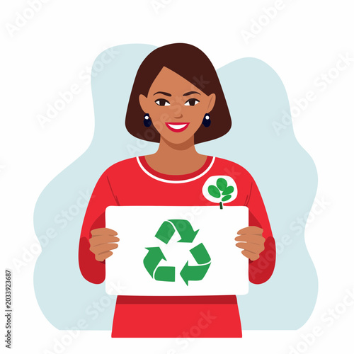 Woman holding recycling symbol sign