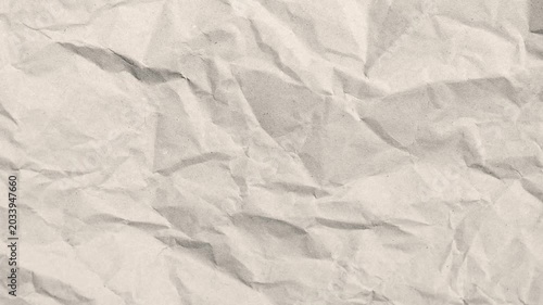Minimalistic background with a white crumpled paper texture. Animation of a freeze frame when unfolding crumpled paper.