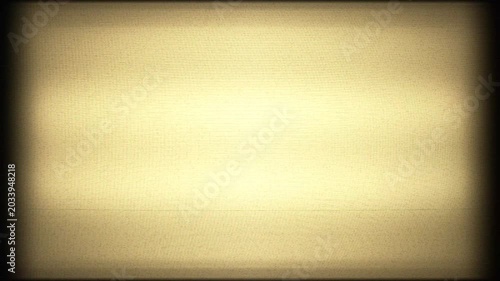 The grainy texture of the film is a warm beige color. The background is made of analog scan lines with a vintage yellow tint.