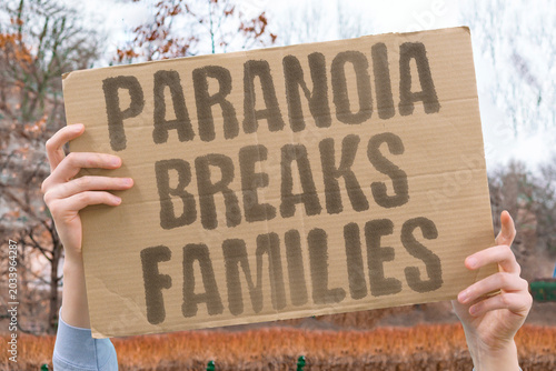 Fotografie "Paranoia Breaks Families" Fearful suspicion damages emotional closeness