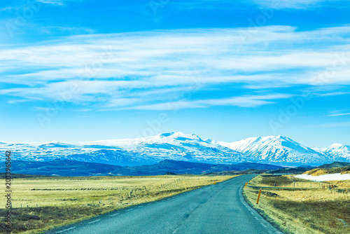 Driving on the road of north east Iceland in spring, vast northern landscape