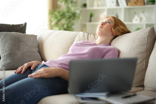 Overwhelmed student complaining and wasting time at home